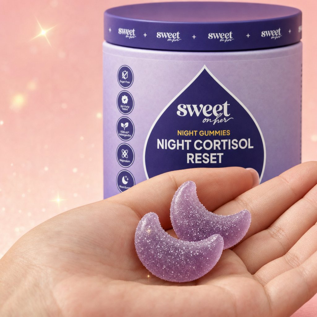 Hand holding lavender berry moon-shaped Night Gummies